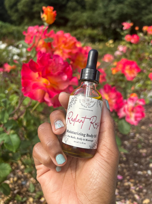 This organic rose body oil doubles as a vegan massage oil, made with organic rosehip oil, avocado oil for the perfect rose day.. The photo is the body oil surrounded by garden roses in an Oakland, CA rose garden. Perfect for a hot oil massage